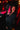Stylish male model with pink lipstick holding Elite Vodka Angel Edition cranberry bottle in VIP bar setting with ice bowl and red lighting - Premium vodka for rebellious nightlife empowerment