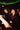 Confident man in black shirt drinking directly from Elite Vodka bottle in vibrant neon-lit luxury bar with party atmosphere - Premium spirits for rebellious nightlife celebration